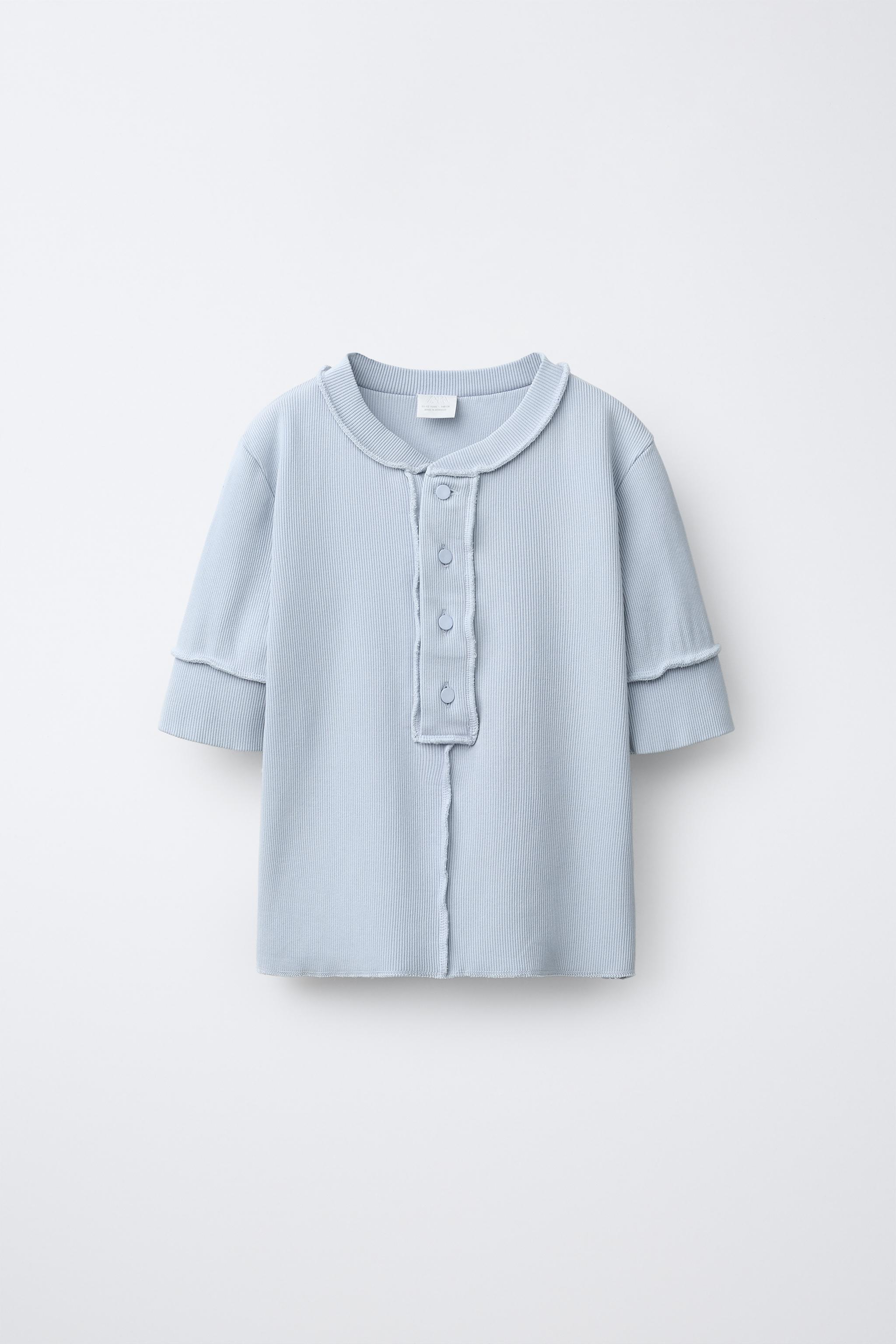 T-SHIRT SURJETÉ À BOUTONS